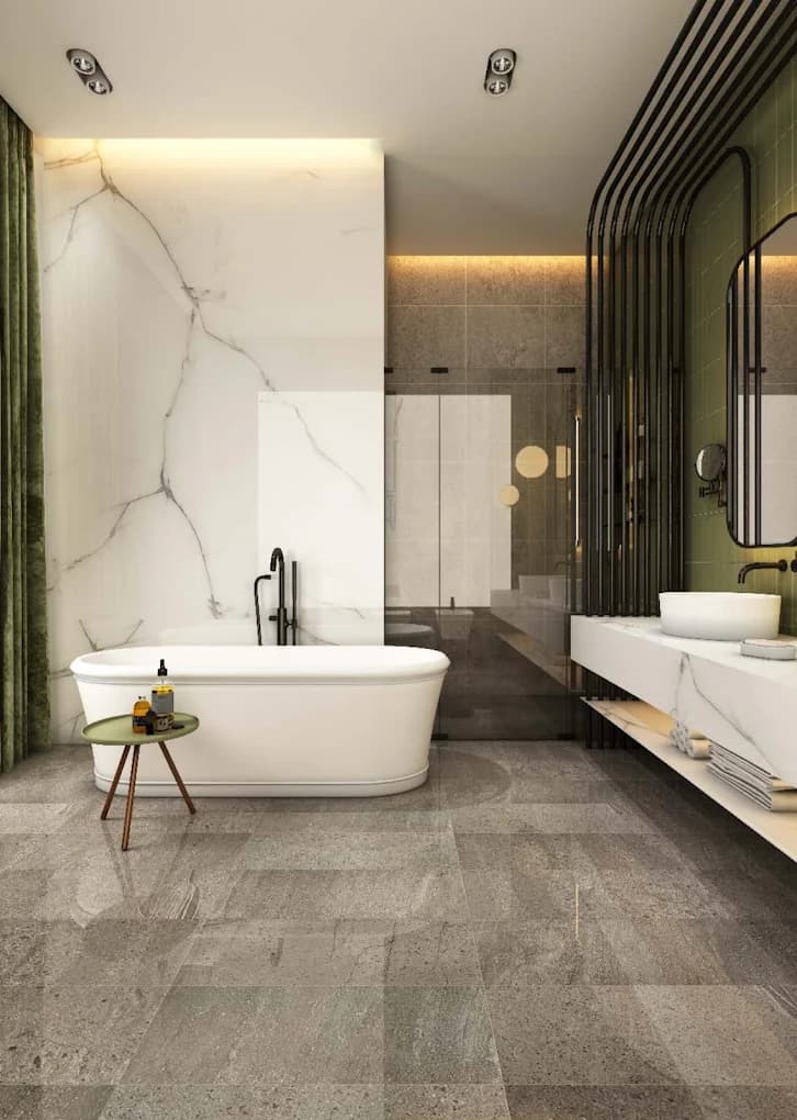 Freestanding tub and marble feature wall — bathroom remodel design from H&E's Houston showroom collection